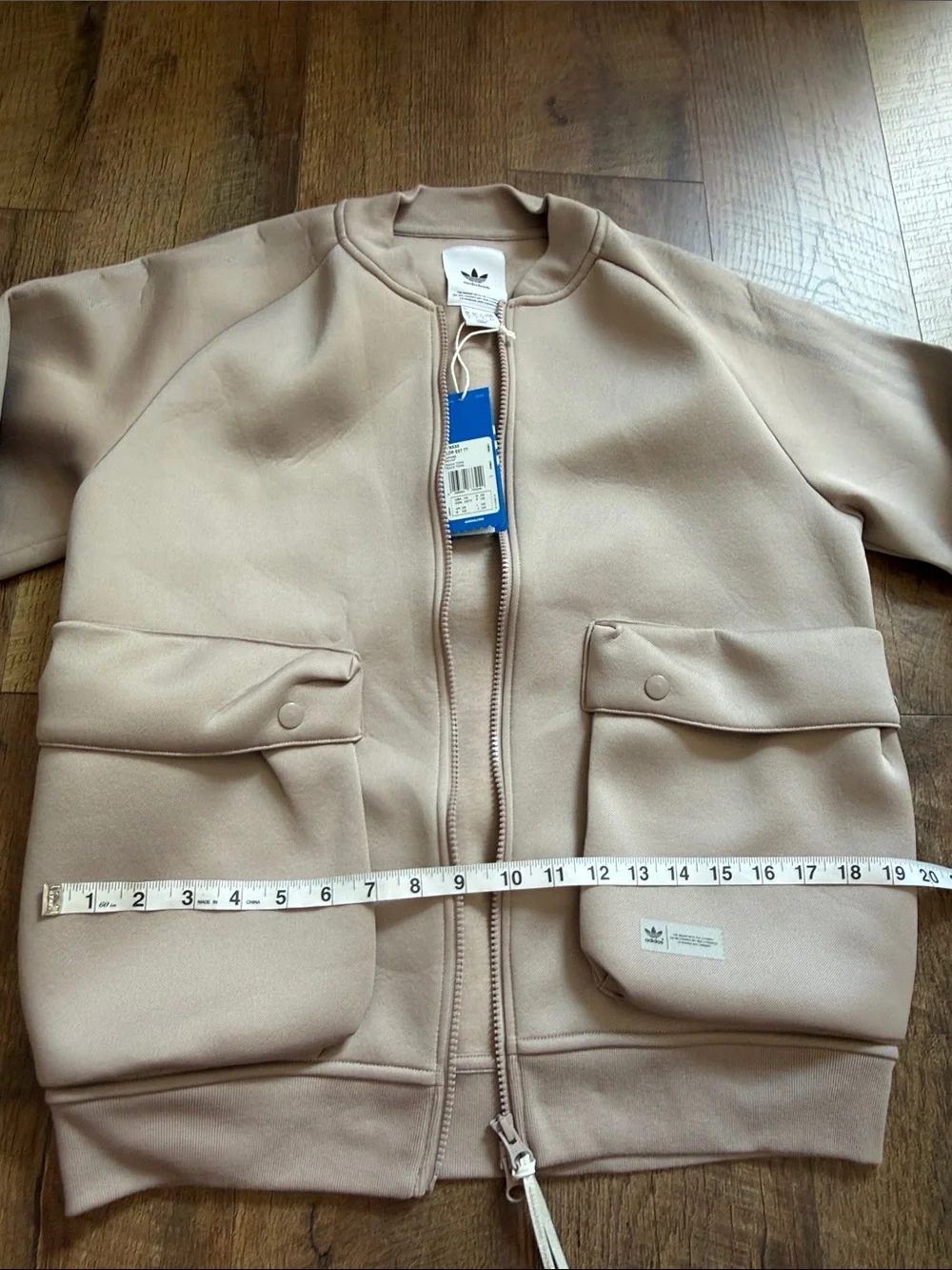 adidas beige bomber jacket with front flap pockets